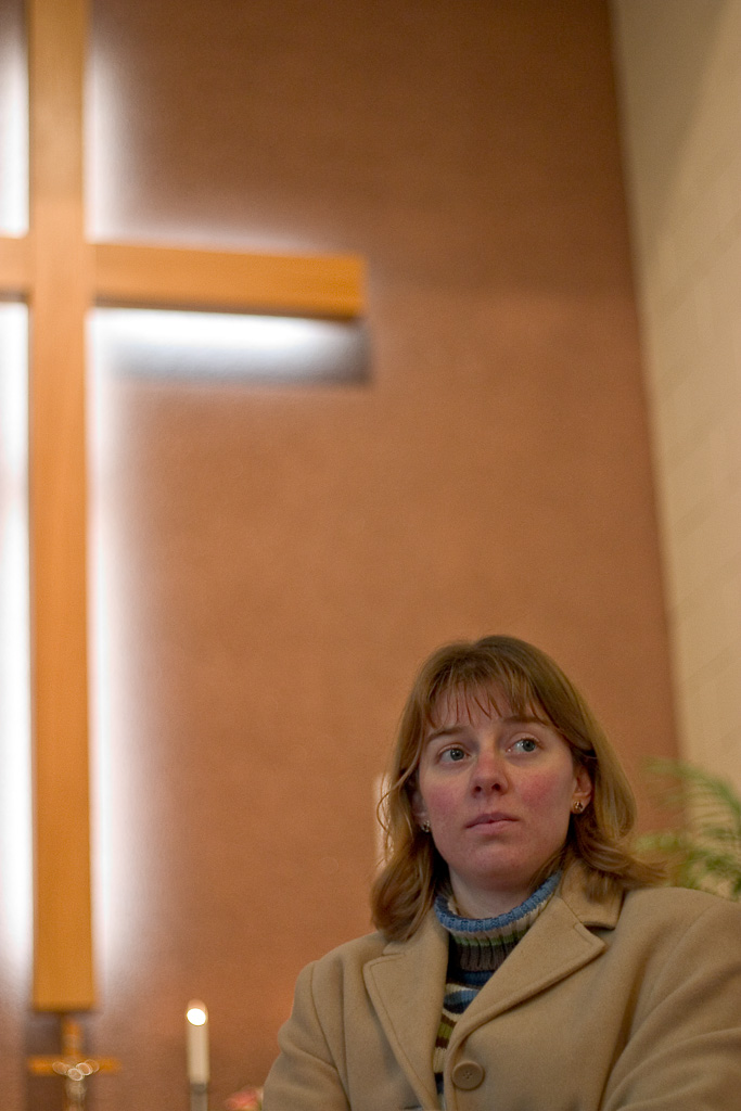 My lovely wife waiting patiently as I did some test shots in her local church. As often happens she stood still too long and hence got photographed.