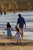 Part of an extensive set of Andrew and his daughters on the beach. I liked the feel of the youngest rushing to catch up with her dad and sister.