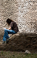 We were doing the tourist rounds of the Palatine hill when  I noticed this guy in the classic pose of peaceful thought and concentration. I thought it balanced well with rock and wall and left me wondering if 2000 years ago some Roman senator may have sat in a similar spot to read. This image is also a good example of how the mind only wants to see what it likes. When I reviewed the set of pictures I found his partner just off to the left gesticulating vehemently. My guess that far from sitting in peaceful concentration he had actually gotten them lost and was trying to nut it out with the insistent help of his loving partner.