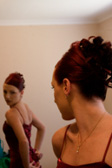 The same wedding as below, I like these kind of natural light shots. It is a bit derivative in that it has been done so many times before, but I love the effect and the concentration of the bridesmaid as she tries to get the bow just right give her posture a really intense feel. Much less light in this room than the one below so took the ISO right out there and had to live with a low shutter speed (hand held of course). I actually like the effect of the high ISO noise and feel it gives a more classic feel (at least in this image).